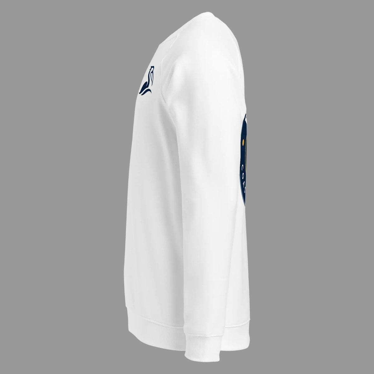Product mockup of a white crewneck sweatshirt with a small navy blue Beak & Tide Pelican logo on the left chest, side view.