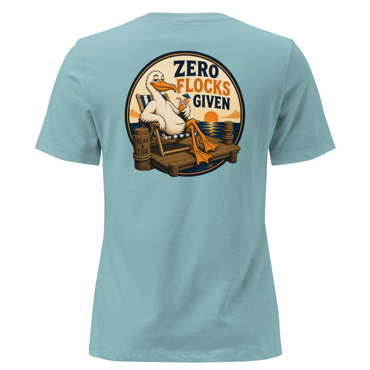 Product mockup of a heather blue graphic t-shirt with a circular Beak & Tide 'Zero Flocks Given' Pelican logo on the back.